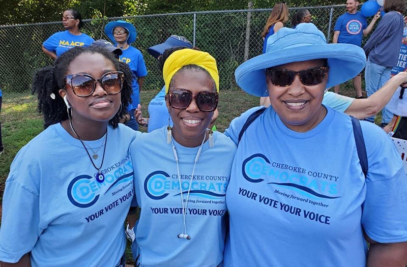 Former board member Felicia Lewis with other CCD volunteers at the Woodstock 4th of July Parade