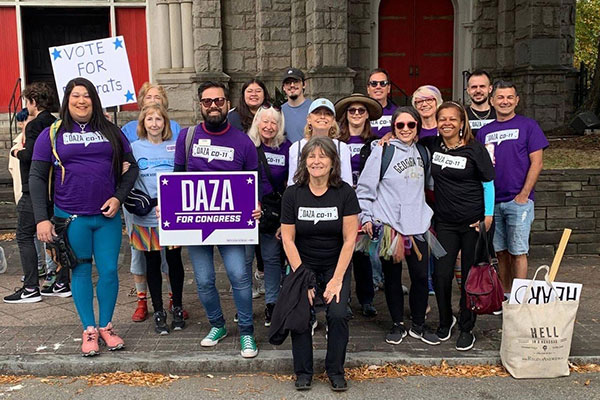 Cherokee volunteers with candidate Antonio Daza at the Pride parade